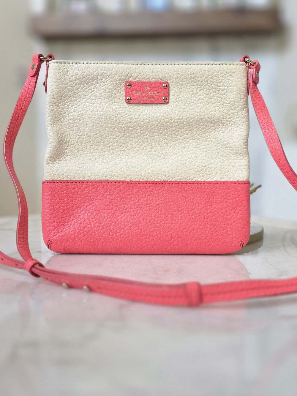 Kate Spade New York Grove Court Cora Crossbody Bag in Cream and Coral